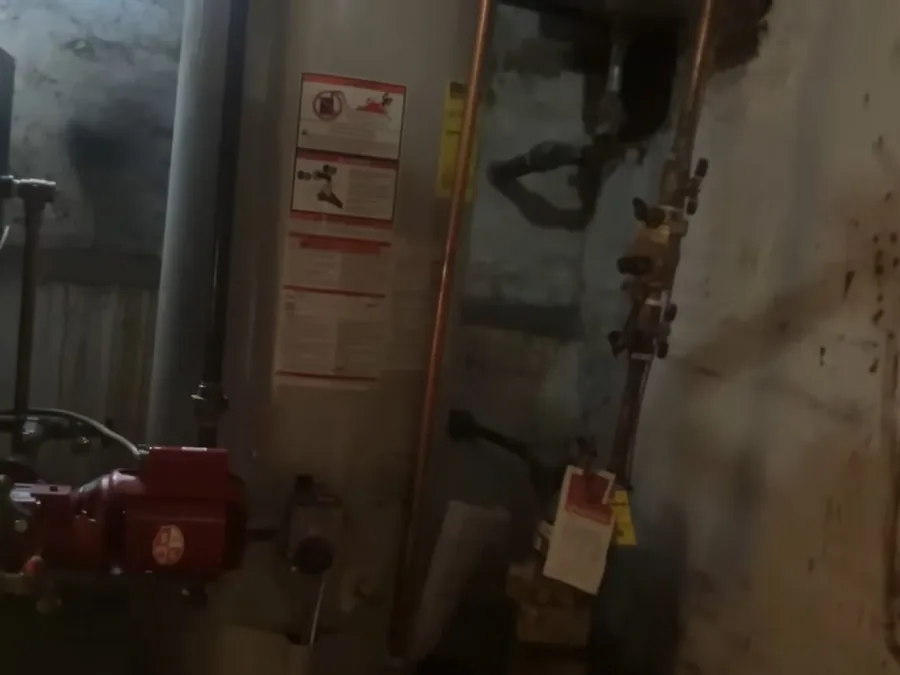 Backflow preventer testing gauge connected to an irrigation supply assembly