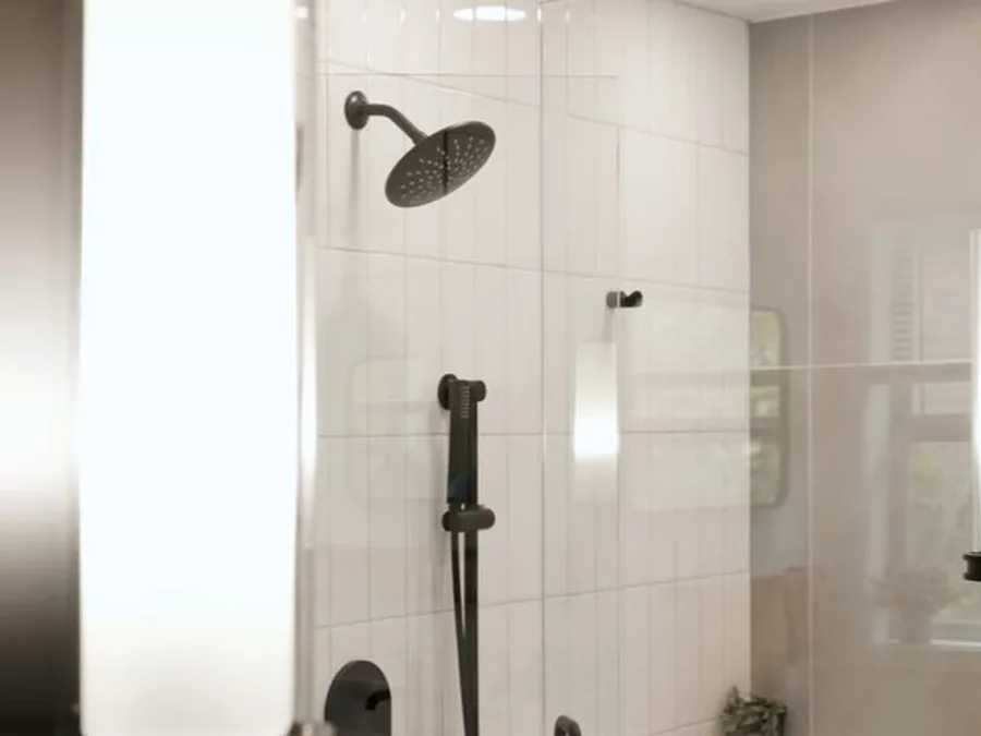Finished glass shower with black trim and shower fixture installed
