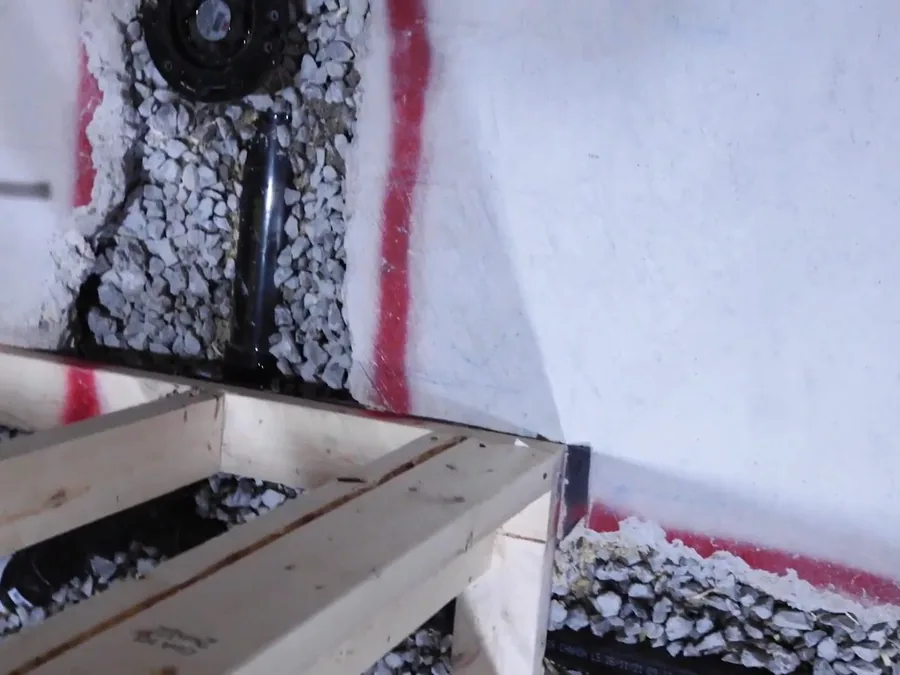 Wall surface wet from a pipe leak during emergency repair work