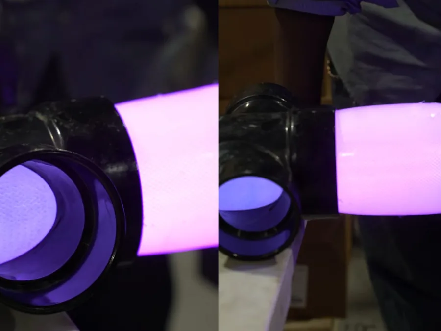 Hydro jetting nozzle glowing inside a pipe during high-pressure cleaning