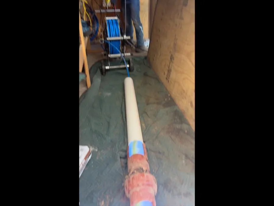New water line installed inside a narrow trench