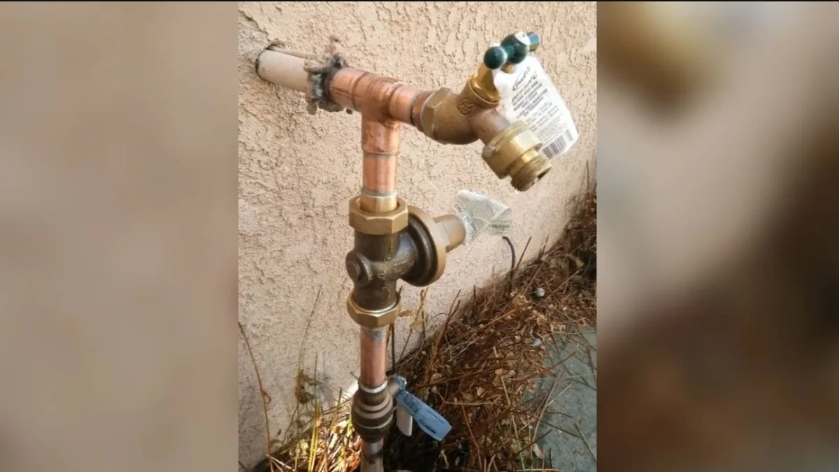 Outdoor hose bib and valve assembly on a wall during a Tujunga plumbing call