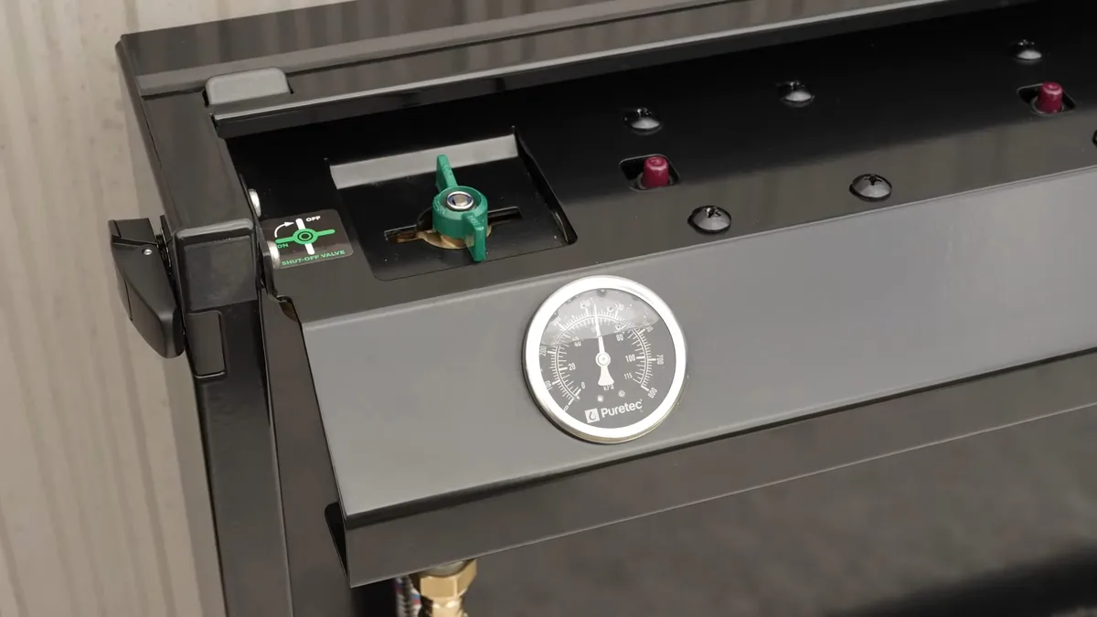 Pool equipment control panel and plumbing connections for a hillside estate system