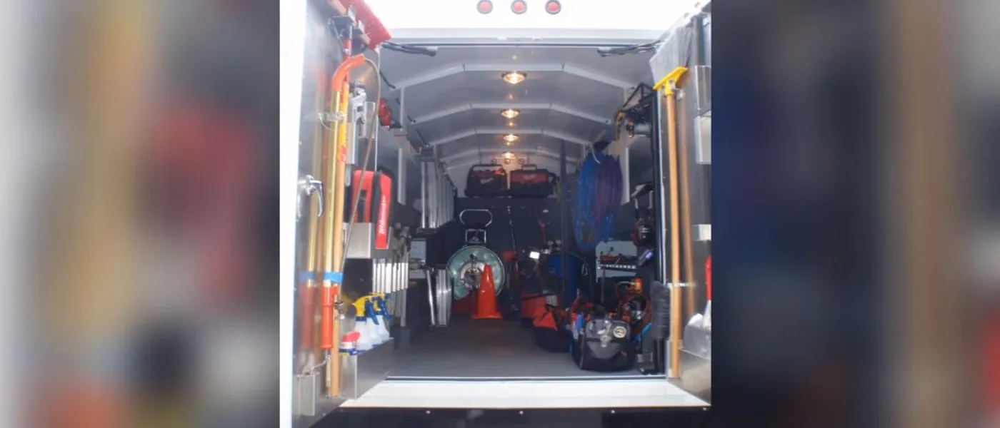 Organized plumbing repair tools inside a service vehicle for urgent residential calls