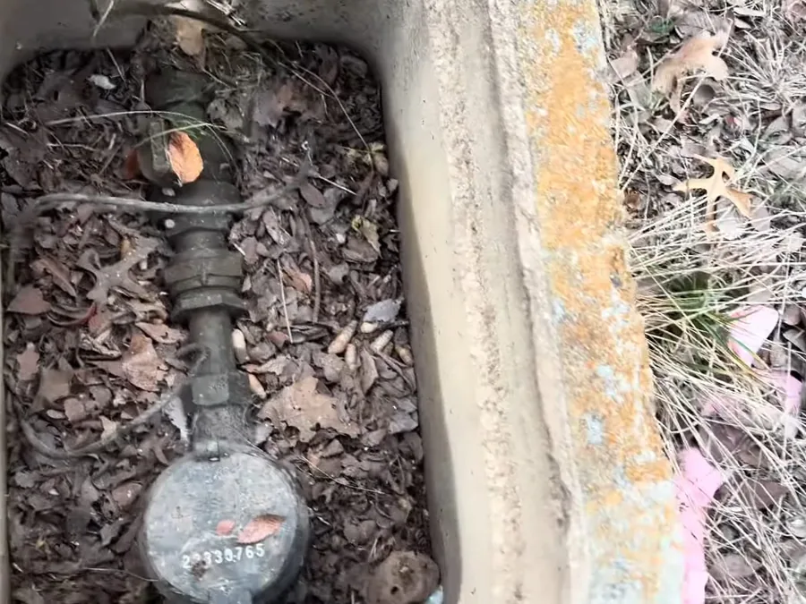 Street-level water meter and shutoff box used for emergency water cutoff