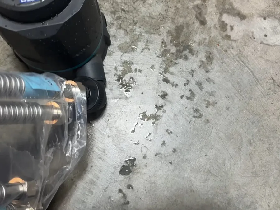 Tankless water heater flush hose connected for descaling service