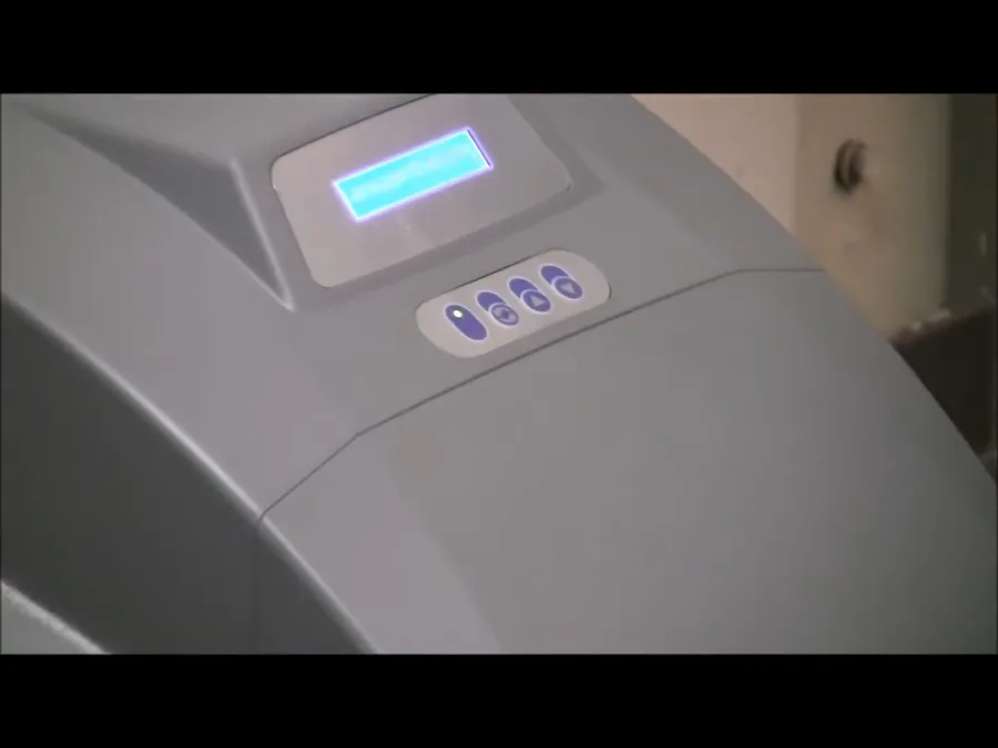 Water softener control head display during programming